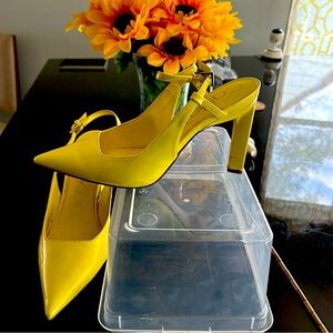 Yellow sling back pump. Only worn twice